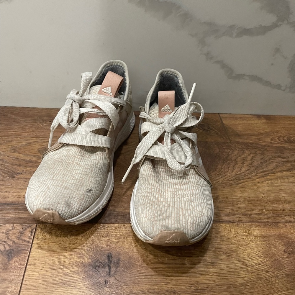Pink and white adidas sneakers